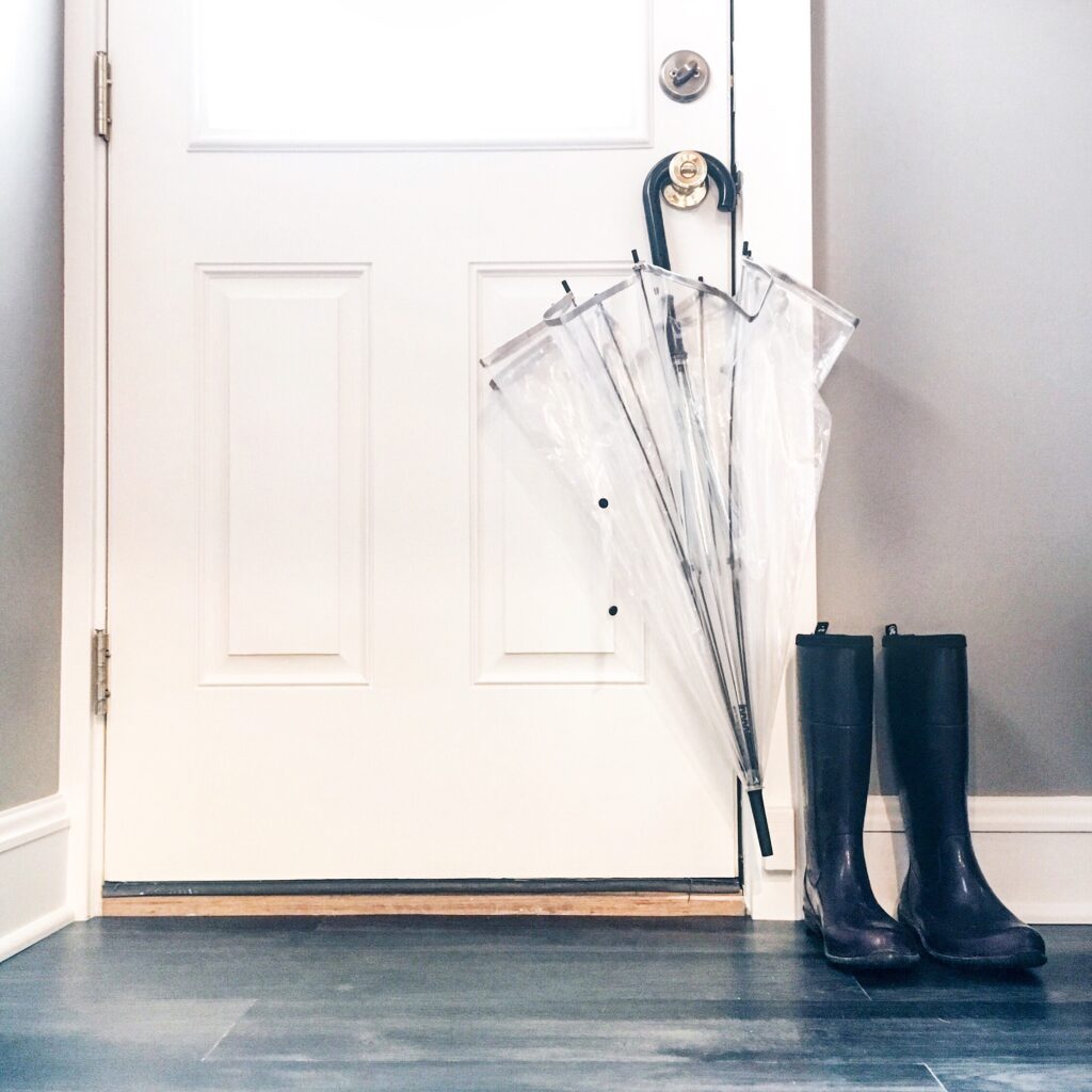 white door and grey floors